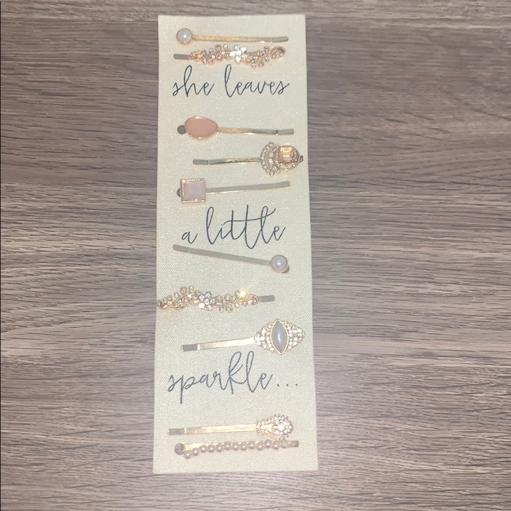 Francesca’s gold embellished hair clips/pins
